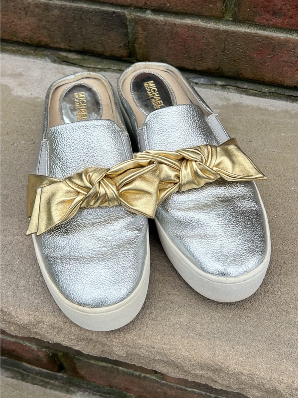 Michael Kors Metallic Silver Slip-On Mules with Gold Knot